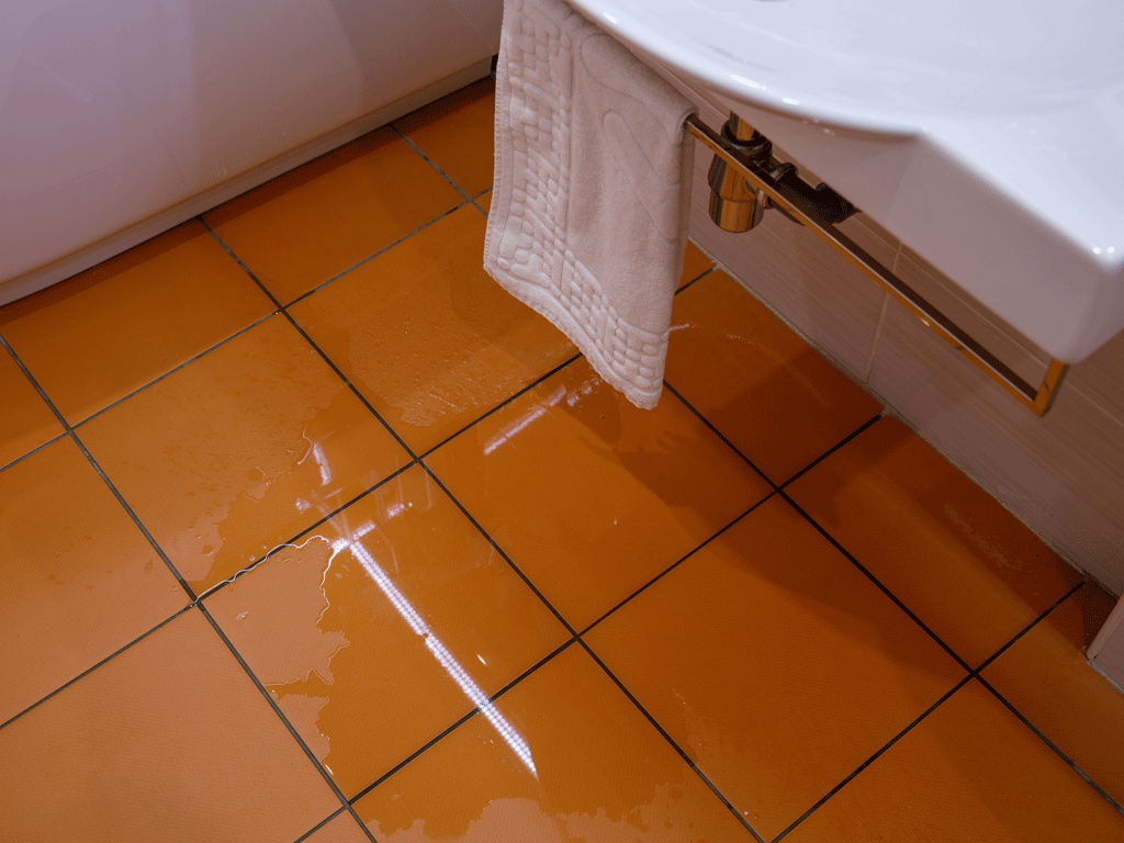 water on orange tile | plumbing maintenance sedona az prescott az 